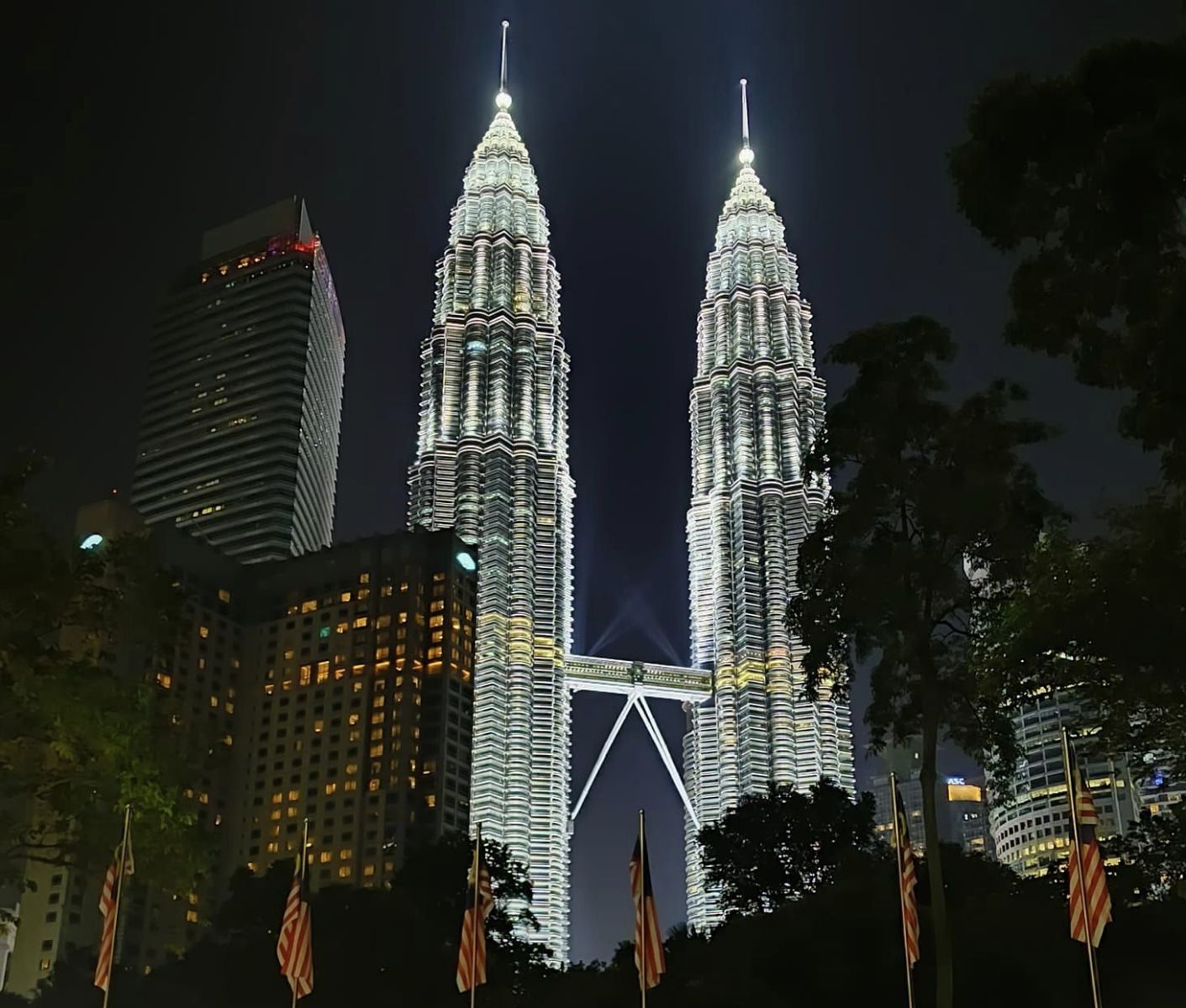 Petronas Towers illuminated at night in Kuala Lumpur