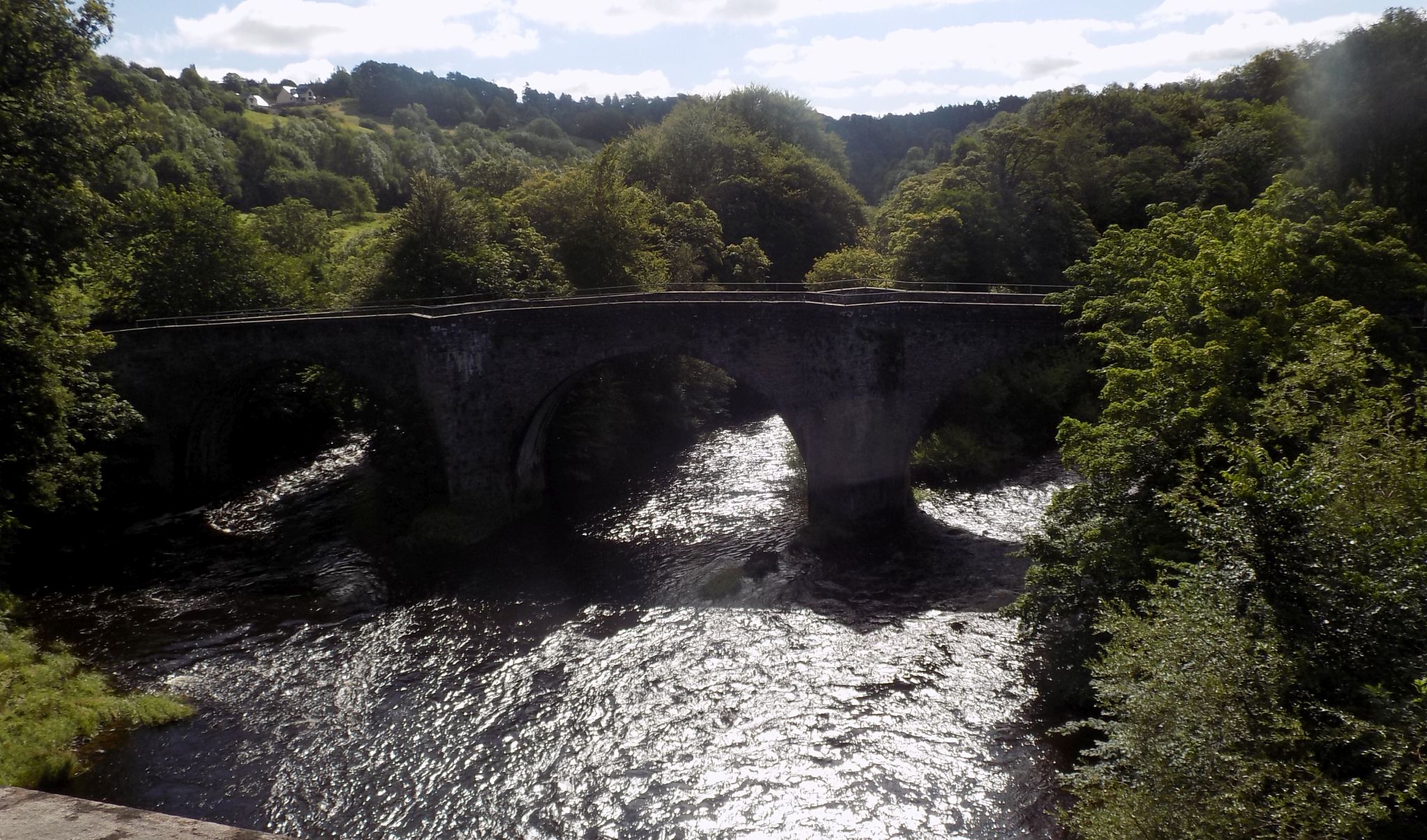 17th century Clydesholm Bridge over the River Clyde at Kikfieldbank