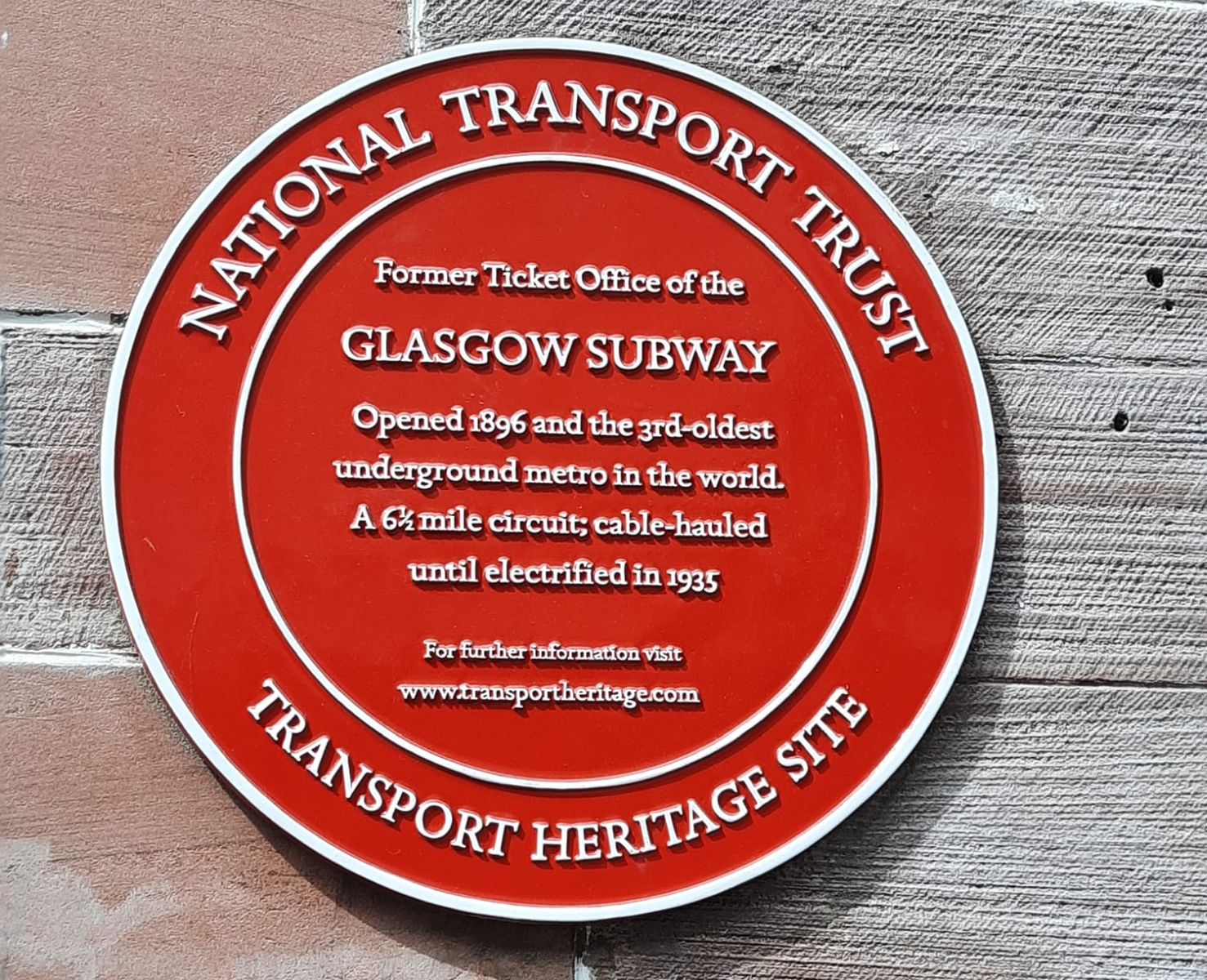 Plaque on the Travel Centre Building in St.Enoch Square at foot of Buchanan Street in Glasgow city centre