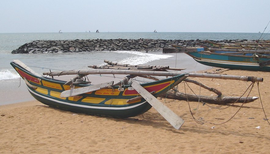 Outrigger Fishing Boat on beach at Negombo on West Coast of Sri Lanka